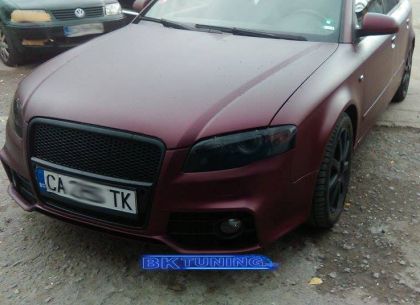 Предна броня за Audi A4 B7 8E (2004-2008) - S-Line Design с черна решетка с отвори за парктроник